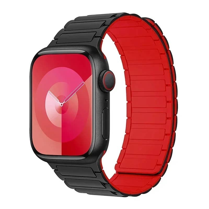 Bracelet Apple Watch silicone noir avec intérieur rouge magnétique – dynamique et robuste.